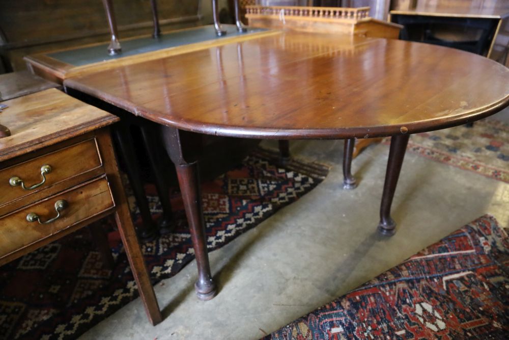 A George III mahogany pad foot oval drop leaf dining table, 170cm extended, width 120cm, height 74cm